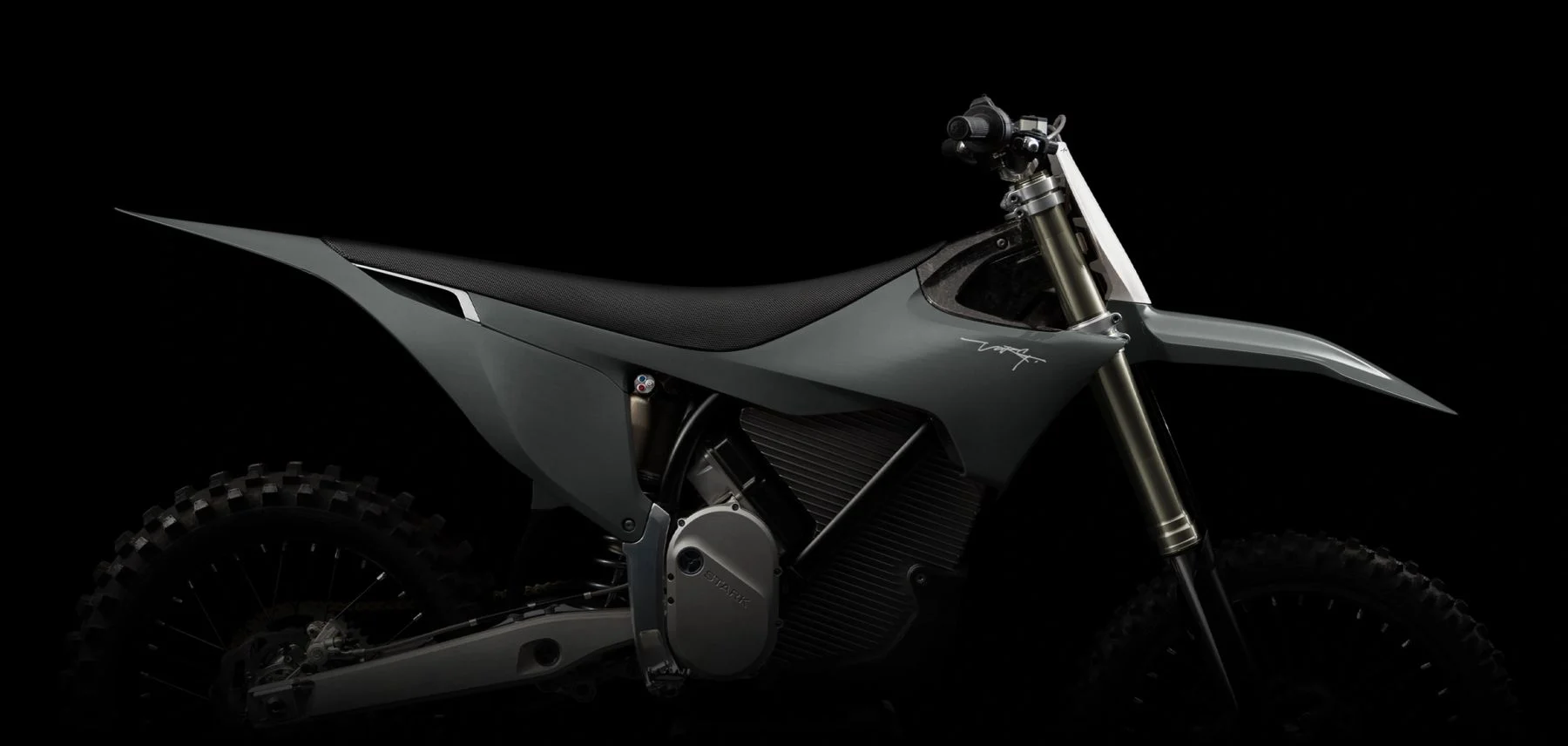 Stark Varg electric dirt bike in a forest setting